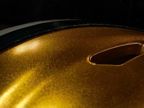 Close-up of a gold car body