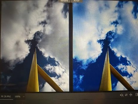 A yellow sculpture against clouds, shown as two frames side by side